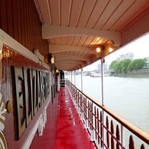 Explore London while enjoying afternoon tea on a Thames river cruise